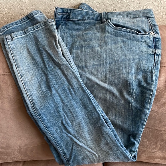Light wash, distressed, stretchy jeans. - Picture 1 of 4